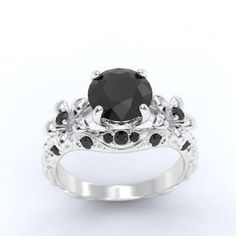 a black diamond engagement ring set in white gold