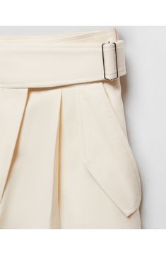 Crisp front pleats accentuate the classic style of belted wide-leg pants that will play a key role in your office wardrobe. Zip fly with hook-and-bar closure Front flap pockets Attached belt 79% cotton, 21% linen Machine wash, line dry Made in Turkey Formal White Wide Leg Pants With Belt Loops, Elegant White Wide Leg Pants With Belt Loops, Elegant Belted Paperbag Waist Bottoms, Elegant Belted Bottoms With Paperbag Waist, Beige Wide Leg Pants For Work With Belt Loops, Cream Wide-leg Pants With Belt Loops, Cream High-waisted Wide Leg Pants With Belt Loops, Tailored Cream Wide Leg Pants For Work, Beige Belted Bottoms For Work