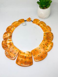 Product name:  Spiny oyster Shell Necklace We take order work as well. Feel free to contact for purchasing goods in bulk. We are Wholesaler & manufacturers of semi-precious & precious gemstones, Loose Gemstones Beads, Cabochons. Measurements & weight are close approximations Luxury Handmade Orange Necklaces, Orange Multi-strand Jewelry For The Beach, Antique Orange Necklaces With Polished Beads, Unique Luxury Orange Beads, Unique Hand-strung Orange Necklace, Spiny Oyster Jewelry, Sea House, Necklace Orange, Spiny Oyster