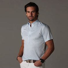 Oxford Button Down Collar Polo Light Blue – Collars & Co. Fitted Light Blue Polo Shirt With Polo Collar, Light Blue Fitted Polo Shirt With Polo Collar, Fitted Light Blue Polo Shirt, Short Sleeve Polo Shirt For Summer Golf, Summer Short Sleeve Polo Shirt For Golf, Fitted Light Blue Short Sleeve Polo Shirt, Modern Short Sleeve Polo Shirt For Formal Occasions, Blue Short Sleeve Polo Shirt For Workwear, Classic Short Sleeve Golf Polo Shirt