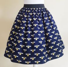 Bees Skirt Gathered  full skirt made from a beautiful 100% cotton, Navy Bees fabric. Each skirt is made by gathering the fabric onto  a 2 inch black elastic waistband. The length measures from the top of the waistband and comes in three lengths, 19", 22" or 25". Please choose length from the drop down menu. The waist measurement can be seen in the measurement guide below. Please choose waist size from the drop down menu. The skirt is pictured with a petticoat to show its potential fullness, whic Nature Skirt, Bee Fabric, Tartan Skirt, Hippie Skirts, Space Outfit, Bee Friendly, Quirky Fashion, Red Tartan, Gathered Skirt