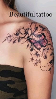 a woman with a butterfly tattoo on her shoulder