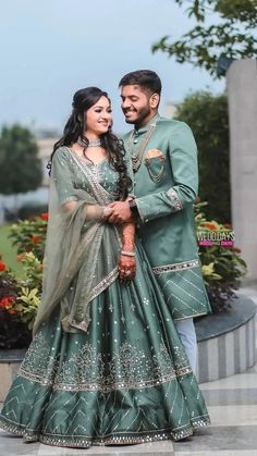 Indian Couple Wedding Outfit Bridal Lehenga, Couple Poses Lehenga, Matching Engagement Outfits For Couple, Bride Groom Outfits Indian Wedding, Engagement Lehenga Indian Couple, Couple Dress Matching Indian Party Wear, Bride And Groom Engagement Outfit, Bride Groom Color Combination Indian, Couple Engagement Dress Indian Matching