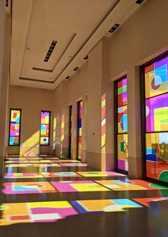 colorful stained glass windows in a large room