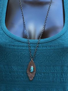 "This copper feather pendant features a stunning old stock (1970's) natural Kingman turquoise (or any stone of your choice) highlighted with an organic, tribal stamped design. The copper has been oxidized for a rustic, aged look. This necklace features an extra long, solid copper chain and looks great worn alone or layered with other necklaces. The necklace in the photos has sold so expect some slight variations in texture or stamping as your pendant will be made just for you. Your necklace &amp Bohemian Turquoise Oval Pendant For Jewelry Making, Handmade Artisan Turquoise Teardrop Pendant Necklace, Handmade Southwestern Necklace With Teardrop Pendant, Artisan Hand Forged Necklaces For Festival, Blue Bohemian Hand Forged Necklace, Handmade Southwestern Necklace With Oval Pendant, Handmade Southwestern Style Oval Pendant Necklace, Spiritual Turquoise Necklace With Patina, Handmade Southwestern Teardrop Pendant Necklace