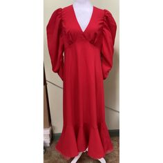 This Tuckernuck Kensington Dress In Size L Is Perfect For Any Casual Occasion. The Dress Features A Solid Red Color With A V-Neckline And 3/4 Puff Sleeves. It Has A Pullover Closure With A Zipper Accent And Is Made Of Polyester Material In A Knit Fabric Type. The Dress Falls In A Midi Length And Has A Shift Style. It Also Includes Lined And Ruched Features, Making It A Great Addition To Any Wardrobe. Whether It's Winter, Summer, Fall Or Spring, This Dress Is Perfect For Any Season. Made In China, This Dress Is Machine Washable For Easy Care. Size & Fit Can Be Affected By Garments Age/Brand/Style/Type/Wash/Wear. To Ensure Proper Fit, Always Compare Provided Measurements To A Similar Garment Red Midi Dress With Gathered Sleeves, Red Puff Sleeve Midi Dress For Spring, Fitted Red Midi Dress With Gathered Sleeves, Red Lantern Sleeve Dress For Spring, Red Ruched Midi Dress With Puff Sleeves, Red V-neck Dress With Gathered Sleeves, Red Spring Dress With Gathered Sleeves, Chic Red Dress With 3/4 Sleeves, Red Ruched Dress For Daywear