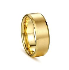 a yellow gold wedding ring on a white background