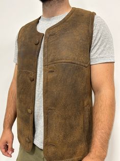 Perfect for three seasons, with the choice to layer on cooler days. Our sheepskin vest are durable, stylish and 100% natural allowing for your body to regulate warm in a productive way. Do you hate how body heat feels from polyester or synthetic fabrics? Then natural sheepskin and wool is the right choice for you. Our rancher vest is made from 100% leather and lined with 100% black mutton sheepskin. Our first model is wearing a size Large, is 6’ 5” and 175 pounds Our second model is wearing a si Sheepskin Blanket, Large Sheepskin Rug, White Sheepskin Rug, Sheepskin Vest, 175 Pounds, Tan Vest, Brown Vest, Sheepskin Jacket, Sheepskin Slippers