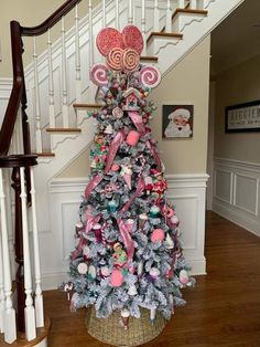 a christmas tree decorated with candy and lollipops