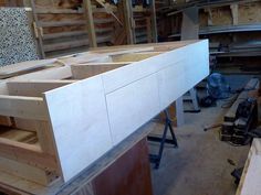 the unfinished counter is ready to be built into the woodwork area in the shop