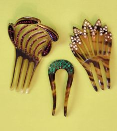 Set of 3 Art Deco era hair combs made of Celluloid & decorated with tiny jewels in crimson, emerald & silver.  Silver is 2.5" x 5", in very good vintage condition, missing one stone, some lost color.  Red is 3"x5", in good condition, missing 4 stones Green is 1.75" x 4", in excellent vintage condition. Red Rectangular Art Deco Jewelry, 1930’s Jewelry, Jeweled Hair Comb, Jeweled Hair, Art Deco Silver Clip-on Jewelry, Art Deco Hair Comb Wedding, Art Deco Hair Combs, Hair Jewellery, Hair Jewelry Wedding