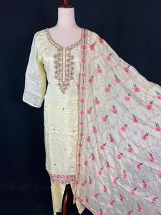 Gorgeous Pastel Yellow Color 3pcs Readymade Suit for Women. Pure Chinnon Silk with Chiffon Dupatta. Excellent and very soft quality. - Item: 3pcs- Bust Size : 40 (Margin to open size- 44)- Includes lining : Yes- Length of Kameez - 45 inches- Sleeves of Kameez - 20 inches- Length of Bottom - 38 1/2 inches Kameez (Top) - Kameez has Handwork on the neckline with Mirrors, Beads and Sequin and Embroidery . No work on the backside however there is a dori (Please see pics for reference). Material is So Festive Pista Green Palazzo Set With Floral Embroidery, Festive Pista Green Floral Embroidered Palazzo Set, Silk Straight Kurta With Dori Work, Pista Green Palazzo Set With Floral Embroidery, Embroidered Pista Green Palazzo Set For Diwali, Bollywood Style Pista Green Palazzo Set With Floral Embroidery, Pista Green Dola Silk Sets, Pista Green Silk Salwar Kameez With Dori Work, Silk Salwar Kameez In Pista Green With Dori Work