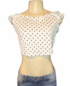 Take a look at this sexy, yet classy Polka a Dot crop top for the summertime! It features white/black polka dots Ruffle details on short sleeves slip on design with a boat neckline Material 95% rayon and 5%Spandex Length from high point of shoulder to hem 13 Fitted Summer Crop Top With Short Sleeves, Trendy Polka Dot Tops For Summer, Trendy Short Sleeve Tops With Polka Dot Pattern, Trendy Polka Dot Short Sleeve Tops, Fitted Cropped Polka Dot Top, Polka Dot Fitted Cropped Top, Stretch Polka Dot Summer Tops, Stretch Polka Dot Tops For Summer, Summer Stretch Polka Dot Tops