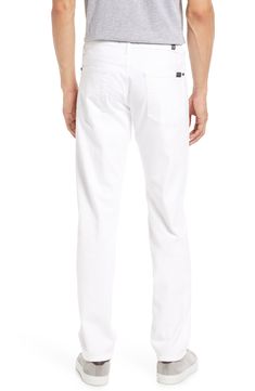 Slim but not tight, these jeans feature a classic white wash and soft stretch denim that gives this pair staple status. 33" inseam; 14" leg opening; 10" front rise; 14" back rise (size 32) 92% cotton, 6% elastomultiester, 2% elastane Dry clean or machine wash, tumble dry Imported For All Mankind, White Wash, 7 For All Mankind, Classic White, Stretch Jeans, Stretch Denim, Tights, Dry Clean, Slim Fit