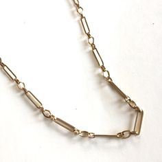 Minimum order is $10.00 - Prior to shipping charges. A gorgeous brass statement chain that's hand made and can be oxidized or plated. This style is similar to my Wyatt Chain. Not soldered, easy to open and close for your desired lengths. The largest link measures 22mm x 5.5mm x 1.2mm square wire. 1 Order = 2 Feet, If you order multiple orders, you'll receive one continuous piece. Here are some similar styles: Corey Chain https://www.etsy.com/listing/191000587/vintage-corey-chain-heavy-brass-chai Brass Jewelry With Oval Link Cable Chain, Brass Chain Link Necklace With Lobster Clasp, Oval Link Brass Chain Jewelry, Brass Gold Chain Link Necklace, Brass Jewelry With Oval Link Chain, Antique Gold Brass Chain Jewelry, Gold Metal Box Chain Necklace, Metal Paperclip Necklace With Gold Chain, Antique Gold Metal Chain Necklace As Gift