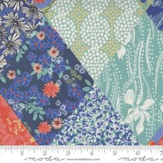 an image of a patchwork fabric with flowers on it