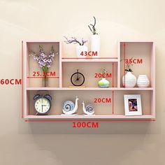 three shelves with different types of vases and pictures on them, measurements for each shelf