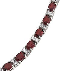 Colleen Lopez Gemstone and White Zircon Tennis Bracelet A testament to timeless elegance and refined taste, this sterling silver tennis bracelet sparkles with oval-cut gemstones and round white zircon.       S/M approx. 6-3/4"L x 1/8"W     M/L approx. 7-1/2"L x 1/8"W     Stamped .925 sterling silver; rhodium plating     Box clasp with double safety catches   Stone Information       All sizes and weights approximate     Total Carat Weight: 12ct (S/M Blue Topaz), 12.8ct (S/M Garnet), 13.2ct (M/L B Elegant Tennis Bracelet With Cubic Zirconia Stones, Oval Tennis Bracelet With 17 Jewels And Cubic Zirconia, Oval Jewelry With Sparkling Stones For Formal Occasions, Oval Cubic Zirconia Tennis Bracelet In Fine Jewelry Style, Oval Gemstone Tennis Bracelet In Fine Jewelry Style, Classic Oval Jewelry With Sparkling Stones, Fine Jewelry Oval Cubic Zirconia Tennis Bracelet, Sterling Silver Oval Tennis Bracelet For Anniversary, Oval Gemstone Tennis Bracelet For Anniversary