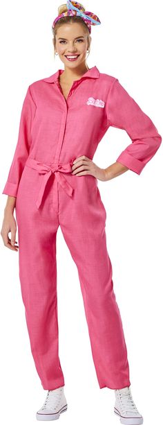 a woman in pink jumpsuits posing for the camera