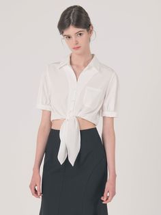 Editor's Notes This short-sleeve top is a trendy twist to a classic shirt blouse.  It is punctuated with a tie-up ribbon strap in the front for fun look.- Shirt blouse with collars  buttons  and front pocket- Wide tie-up ribbon strap in the front- Slightly puffed sleevesMeasurements(in.)S / M- Length: 16.54 in. / 16.93 in. - Shoulder: 15.35 in. / 15.75 in. - Bust: 36.61 in. / 38.19 in. - Waist: 32.28 in. / 33.86 in. - Sleeve: 9.45 in. / 9.64 in.*All measurements are Casual Shirt With Tie Sleeves, Casual Work Shirt With Tie Sleeves, Elegant Short Sleeve Tops For Office Wear, Casual Office Tops With Tie Sleeves, Casual Tie Sleeve Tops For Office, Chic Shirt With Tie Sleeves For Workwear, Formal Short Sleeve Tops For Office, Short Sleeve Office Tops, Summer Office Blouse With Short Sleeves