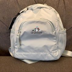 Super Cute Mini Backpack , Perfect For Kids Or Young Adults Very Light Mint Green Holographic Adidas Logo Size: 8.5" 4.25" X 10.5" White Adidas Sporty Backpack, Adidas Sporty White Backpack, Adidas White Sporty Backpack, Adidas White Standard Backpack, White Adidas Backpack For Daily Use, White Adidas Backpack For School, Trendy Adidas Backpack For Back To School, Trendy Adidas School Backpack, Adidas Mini Backpack