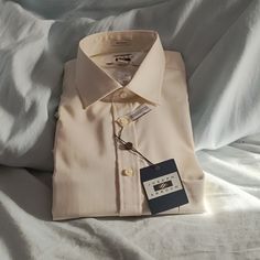 Brand New Off White/Cream Color Dress Shirt. Brought And Never Worn. Neck Is Sized 17.5 Classic Fit Non Iron. Comes From Smoke Free Home. Make Offer And Check Out My Other Items Elegant Short Sleeve Dress Shirt For Spring, Elegant Beige Summer Shirt, Cream Spread Collar Shirt For Spring, Classic Beige Business Shirt, Beige Classic Business Shirt, Elegant Beige Short Sleeve Shirt, Beige Fitted Top For Semi-formal Occasions, Fitted Beige Top For Semi-formal Occasions, Cream Formal Shirt With Spread Collar