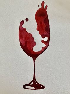 a painting of a woman's face in a glass of red wine on a white wall