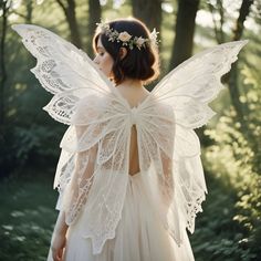 This is beautiful image of an ethereal forest fairy with her delicate, vintage lace wings. The natural sunlight filters through the trees, creating an enchanting atmosphere in a magical woodland realm. The fairy exudes an aura of grace and mystery. Perfect for those inspired by whimsical, bohemian, and fantasy aesthetics. 🧚🏻 #ForestFairy #FantasyAesthetic #VintageLace #FairyWings #WoodlandMagic  #EnchantedForest #Bohemian #Fairy #NatureFantasy #FairyTale Fairy Wings With Flowers, Fairy Wings Aesthetic, Wings Aesthetic, Ethereal Forest, Fairy Diy, Fantasy Aesthetics, Woodland Realm, Lace Wings, Bohemian Fairy