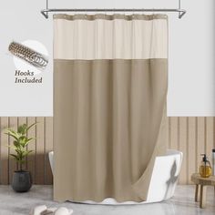 a bathroom with a shower curtain and rug