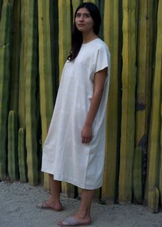 These simple, cotton tunic dresses or caftans are hand woven from 100% cotton in San Pedro Amuzgos, Oaxaca. One size, open fit 28 inches from shoulder to hem 46 inches across Some variation in colour and size can occur due to the handmade nature of this garment. All of our apparel items come packaged in a re-usable, handmade, all natural palm envelope. Unlined Relaxed Fit Cotton Dress, Cotton Tunic Dress With Natural Dye, Relaxed Fit Tunic Dress With Natural Dye, Relaxed Fit Cotton Dress With Natural Dye, Mexican City, Desert Style, Cotton Tunic Dress, Tunic Dresses, Sight Unseen