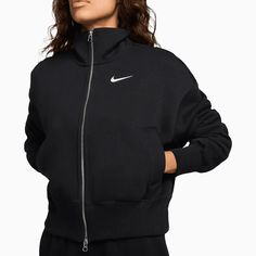 Nike Sportswear Phoenix FleeceWomen's Oversized Track JacketGrounded in style, comfort and versatility, meet our take on luxury loungewear. Made with midweight brushed fleece, this slightly cropped, oversized track jacket helps you step out with a laid-back look. The 2-way zipper gives you styling options. Mix and match within your wardrobe or wear it as part of a matching set.Our midweight brushed fleece feels extra soft and smooth on the outside, helping you stay cozy while keeping its structu