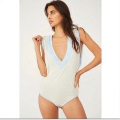 Questions? Leave A Comment Below! Cream Sleeveless Bodysuit For The Beach, Chic Cream Sleeveless Bodysuit, Chic Sleeveless Cream Bodysuit, White V-neck Summer Bodysuit, Cream Bodysuit For Summer Loungewear, Summer Cream Bodysuit For Loungewear, Beige Summer Bodysuit For Loungewear, Beige Bodysuit For Summer Loungewear, Spring Beige V-neck Bodysuit