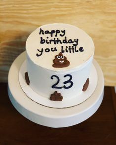 a birthday cake with the number twenty three on it and a happy birthday to you little monkey