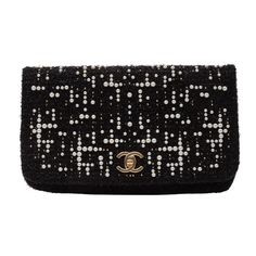 This piece is from the 2017 Paris Cosmopolite collection. The piece features tweed, pearl embellishment, turn lock closure and burgundy leather interior. The name is Fantasy tweed clutch. At 11 inches wide the clutch can fit your phone and essentials for the evening. 67167 Color: Black and white Material: Tweed Code: 24883590 Year:  2017 to 2018 Comes with: Dust bag Condition: Very good. Light use. Faint scratches to hardware. Made in Italy Measurements~ Height 6” Width 11” Depth 1.3” Designer Black Tweed Bag, Black Tweed Rectangular Bag, Chanel Mini Tweed Bag, Chanel Gabrielle Clutch With Chain, Chanel Clutch With Chain 2022, Chanel Black Tweed Bag, Chanel Clutch, Chanel Paris, Leather Interior