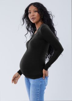 This maternity tee combines supersoft and sustainable rib modal with a classic henley design to bring you the kind of shirt that can bridge seasons. The fitted, stretch-rib fabric is incredibly cute on its own, but factor in that nursing is always just a few buttons away and you’ll be obsessed.  Sustainable modal: Made from the pulp of beech trees using less water and producing less waste. 95% modal / 5% spandex Machine wash cold with like colors. Do not bleach. Lay flat to dry. Do not iron. Fits throughout pregnancy + after Select your pre-pregnancy size Fun fact: being pregnant for nine months means your bump will be stretching across three different seasons. Plus, if you’re planning to breastfeed, that adds another six months (on average!) of maternity/nursing-specific wardrobe necessit Beech Trees, Maternity Wardrobe, Being Pregnant, Henley Long Sleeve, Nursing Top, Maternity Shirt, Pregnancy Wardrobe, Henley T Shirt, Maternity Tees