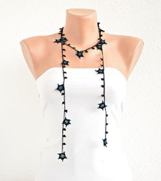 Black Stars Oya Beaded Necklace, Boho Wrap Necklace, Boho Crochet Lariat Necklace, Blue Beaded Necklace. Teal blue beads inside black star shaped crochet flowers. Wrap around crochet oya necklace. Unique as a gift and fashionable as an accessory for you and for your loved ones. There is no Handmade Star Beaded Necklaces For Festivals, Festival Handmade Star Beaded Necklaces, Handmade Star-shaped Beaded Necklace For Festivals, Handmade Star Necklaces For Party, Handmade Lariat Beaded Necklace For Party, Handmade Lariat Necklace For Parties, Handmade Lariat Festival Necklace, Handmade Long Lariat Necklace For Party, Handmade Festival Lariat Necklace