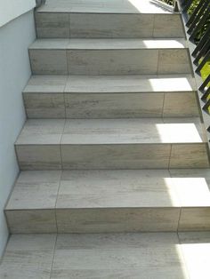 the stairs are lined with concrete blocks