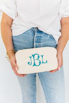 DETAILSThis nylon monogrammed cosmetic pouch is a great size at 10" x 5" x 3". It has a wipeable, and sizable interior to carry anything from bachelorette items to bridal party gifts or travel toiletries. You can personalize this bag for yourself or for someone else by choosing from our 27 color palette. You can never have too many monogrammed bags! This soft nylon monogrammed bag is perfect to carry your makeup, sunglasses, vitamins, and more. We love these for birthday gifts and bachelorette p Monogrammed Makeup Bags, School Pouch, Custom Makeup Bags, Personalized Pouch, Greek Gifts, Pink Embroidery, Monogram Bag, School Stationery, Travel Toiletries