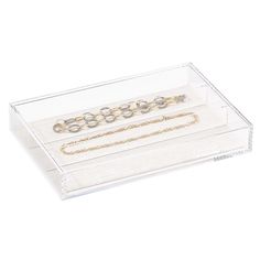 three different types of bracelets in a clear display case on a white background,