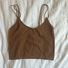 Brown Stretchy Cropped Spaghetti Strapped Shirt. Size S/M Brown Cotton Crop Top Tank Top, Brown Cami Crop Top For Summer, Summer Brown Cami Crop Top, Cropped Brown Cotton Tank Top, Brown Cropped Cotton Tank Top, Casual Cami Top With Straps, Brown Camisole Crop Top For Summer, Casual Camisole Tops With Straps, Brown Cotton Tank Top For Day Out