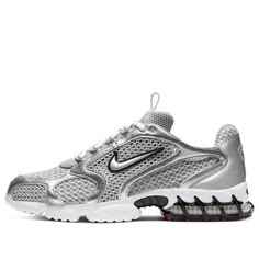 The Nike Air Zoom Spiridon Cage 2 Metallic Silver combines retro flair with futuristic design. Crafted for men, this sneaker features a mesh and synthetic leather upper coated in a sleek metallic silver finish. The raised Swoosh branding on the quarter panel adds a bold touch. Underfoot, a white foam midsole houses a caged Zoom Air unit in the heel for cushioning. The rubber outsole introduces hits of red for a pop of color. Whether you’re hitting the streets or making a style statement, these kicks blend classic aesthetics with modern comfort. The Nike Air Zoom Spiridon Cage 2 Metallic Silver (CJ1288-001) combines retro flair with futuristic design. Crafted for men, this sneaker features a mesh and synthetic leather upper coated in a sleek metallic silver finish. The raised Swoosh brandin Silver Nike Sneakers, Nike Spiridon Cage 2 Outfit, Nike Air Zoom Spiridon Cage 2, Silver Sneakers Outfit 2024, Silver Sneakers Outfit, Chrome Shoes, Nike Air Zoom Spiridon, Nike Gym Shoes, Gym Sneakers