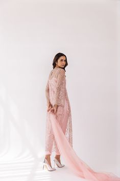 Featuring a peach sheer embroidered v-neck kurta set in net base. It is paired with solid pants and organza dupatta. Color: PEACH FABRIC: NET Delivery time 15 to 20 days Semi-stitched Sheer Dresses For Eid, Sheer Organza Sets For Eid, Peach Sharara With Sheer Dupatta, Unstitched Sheer Sets For Eid, Festive Sheer Organza Sets, Sheer Festive Sets For Eid, Sheer Sets For Festive Occasions Like Eid, Designer Peach Anarkali Set With Sheer Dupatta, Sheer Georgette Sets For Eid