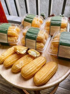 several pastries are sitting on a wooden table