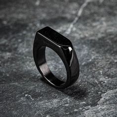 A simple but stylish way to keep your loved one with you at all times. A small quantity of ashes can be inserted into the ring by removing the screw cap to reveal a cavity below. Comes complete with the accessories needed to safely insert the ashes. Minimalist Black Signet Promise Ring, Black Minimalist Signet Ring For Everyday, Modern Matte Black Jewelry As A Gift, Modern Matte Black Jewelry As Gift, Modern Matte Black Jewelry For Gifts, Black Stainless Steel Signet Promise Ring, Black Stainless Steel Jewelry For Memorial, Adjustable Black Minimalist Signet Ring, Memorial Jewelry Ashes Men