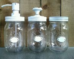 three mason jars with soap dispensers on top