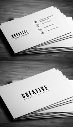 two business cards with the word creative on them