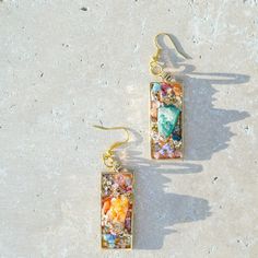 + Stunning Gold Dangling Earrings +Multi Colored Agate/Geode Stone +Electro plated + Handmade in San Francisco, California Multicolor Nickel-free Crystal Earrings For Gift, Nickel-free Multicolor Rectangular Earrings, Multicolor Single Earring As Gift, Multicolor Single Earring Jewelry Gift, Multicolor Rectangular Earrings As A Gift, Multicolor Rectangular Earrings For Gifts, Rectangular Earrings Gift, Gift Rectangular Pierced Earrings, Gift Rectangular Earrings