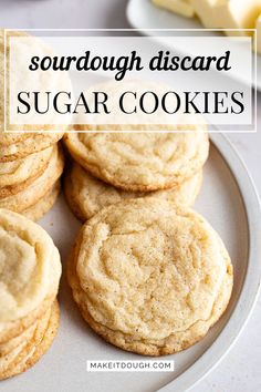 several sugar cookies on a plate with the words, sourdough discard sugar cookies