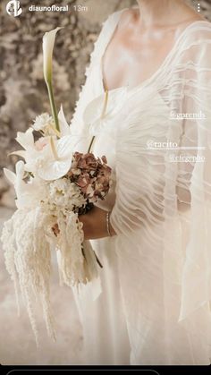 a woman wearing a white dress holding a bouquet of flowers in her hand and the caption reads dianotical 13m