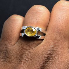 Watch video here Yellow Sapphire Pukhraj Ring Dark deep Color Semi Transparent Natural Stone handmade Ring Band 925 Sterling Silver Ring size 7 US Resize able Natural Yellow Sapphire Contact me for the details Oval Yellow Sapphire Jewelry With Polished Finish, Fusion Style Oval Rings With Polished Finish, Anniversary Yellow Sapphire Jewelry With Polished Finish, Oval Citrine Ring With Spiritual Style, Spiritual Oval Citrine Ring, Silver Yellow Sapphire Rings For Anniversary, Round Sapphire Fusion Ring, Yellow Sapphire Gemstone Rings, Yellow Oval Cabochon Gemstone Jewelry